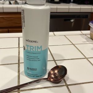 Sealed bottle of chocolate Modere